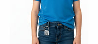 Speak For Me Systems square tag with QR code attached to a belt loop on blue jeans